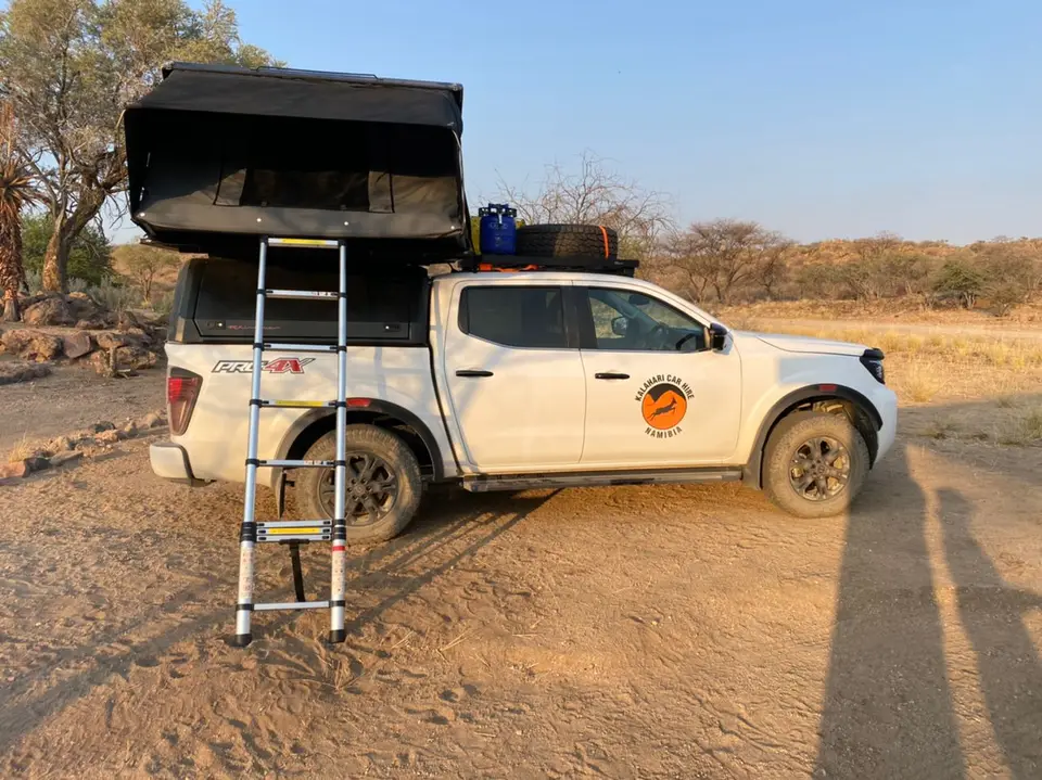 NissanNavaraPro4Xwith2.2x2.4hydraulichardshellrooftent.JPG